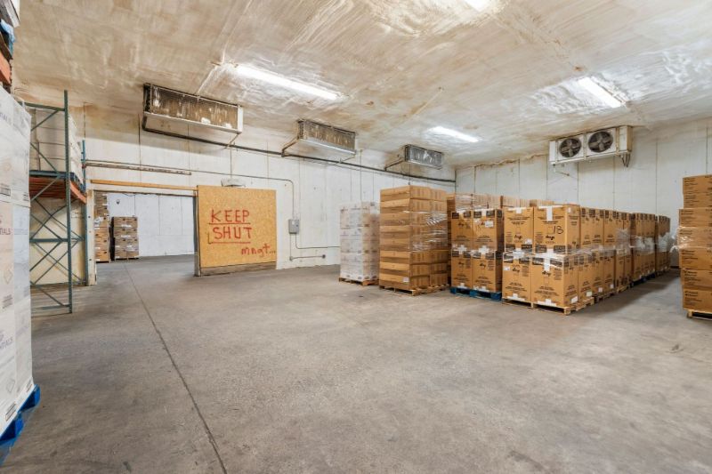 Enclosed storage room inside the warehouse at 1030 SE 4th Street, Gainesville, FL